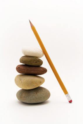 Pile of rocks and a pencil